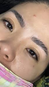 EYELASH EXTENSIONS AND EYEBROW LAMINATION.