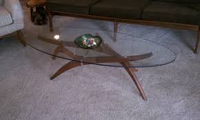 From glass, marble, and wood to coffee tables with storage — we've got options for whatever look you're pining for. Mid Century Modern Teak Base Coffee Table With Adjustable Legs And Glass Top Collectors Weekly