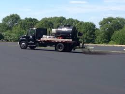 101 Sealcoat Spraying Sealer From Truck T K Asphalt Services