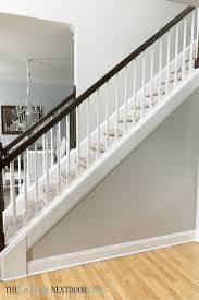 Black And White Stair Railing Ideas Update Your Foyer To A More Elegant Space The Latina Next Door Grey Walls White Trim Stair Railing Makeover Grey Walls