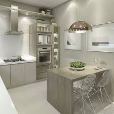 Una ligera barra y dos taburetes, de magis, conforman este pequeño y práctico office. Barras En La Cocina Casa Web