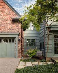 How To Make Your Brick House Feel At Home In The Landscape Brick Exterior House House Paint Exterior Exterior Brick