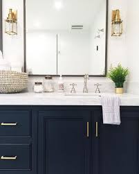 Black And Gold Bathroom Vanity Navy Vanity Gold Hardware Marble Vanity Gold Sconces Countertop Styling Image Via Mindy Gayer Design Bathroom Renos Bathrooms Remodel Amazing Bathrooms