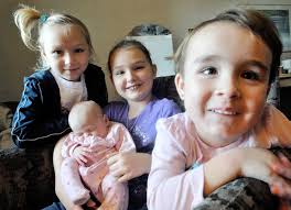 Eight-year-old carried young sister to safety