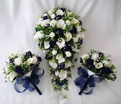 Couple sporting boho and classic details. Navy Blue Wedding Flowers Wedding Flowers Bouquets Brides Bouquet 2 Posies Cala L Flower Bouquet Wedding Inexpensive Wedding Flowers Navy Wedding Flowers