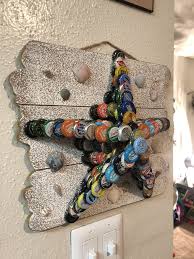 Pin By Crystal Miller On Hedrinkssheglues Beer Bottle Cap Crafts Beer Cap Crafts Bottle Cap Crafts