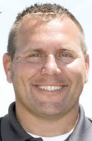 DCSC names '98 grad high school principal