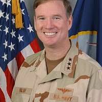 Commander U.S. Naval Forces Central Command/5th Fleet, Vice Adm. Patrick  Walsh, takes part in a ribbon cutting ceremony.