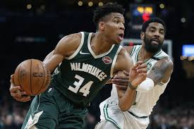 Kyrie irving left the brooklyn nets matchup against the milwaukee bucks on sunday after stepping on giannis antetokounmpo's foot and suffering a brutal ankle injury. Not Just Giannis Deep Milwaukee Bucks Roar Into East Finals