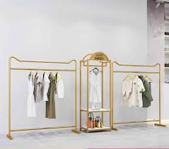 Find & download free graphic resources for clothes rack. Vitrine Rack De High End Loja De Roupas Simples Vestido De Ouro Loja De Ferro Rack Piso Pendurado Rack De Roupas Cabides E Racks Aliexpress Clothing Store Displays Clothing Rack Hanging