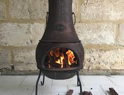 A chiminea is a freestanding fireplace that you load from the front, rather than from the top as you would a fire pit or bowl. Chiminea Cooking How To Cook Pizza On Chiminea Piaci Pizza