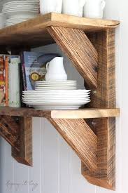 One surefire way to add an embellishment to your home decor is to search for creative and decorative shelves to put up on your walls. Keeping It Cozy Reclaimed Wood Kitchen Shelves Reclaimed Wood Kitchen Scrap Wood Projects Reclaimed Wood Shelves