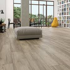The tiles flooring looks perfect with the room's style. Lakewood Olive 10x40 Matte Porcelain Tile Wood Effect Porcelain Tiles Living Room Tiles Porcelain Wood Tile