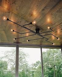 The spacing of the joists averages around 14 inches and the depth of them is about 7 inches, give or maintaining headroom is top priority, the looks of the light fixtures are not important. 7 Best Cheap Basement Ceiling Ideas In 2018 Basement Ceiling Ideas Exposed Low Ceilin Beleuchtung Fur Niedrige Decken Einbau Deckenleuchten Rohr Beleuchtung