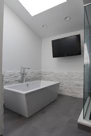 Free Standing Tub With Tv Mounted On Wall Grey White Contemporary Bathroom Modern Master Bathroom White S Modern Master Bathroom Tv In Bathroom Modern Tub