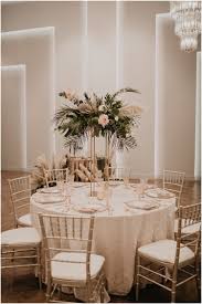 wedding inspiration at the clay theatre jacksonville styled shoot the home of southern charm eve wedding table linens wedding rentals tall centerpieces