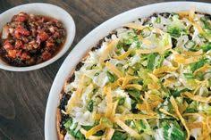 Tricolore Salad Pizza At California Pizza Kitchen Restaurants Our Classic Salad Returns For The Season Made With A Caramelized Parmesa Good Eats Pizza