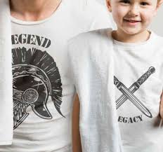 The matching family shirts (and coordinating baby onesies) are styled like jerseys with custom names and numbers on the back. Be Twins With Your Son 2021 Tenstickers