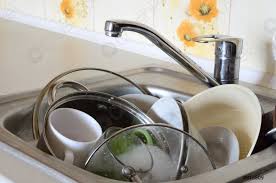 dirty dishes and unwashed kitchen