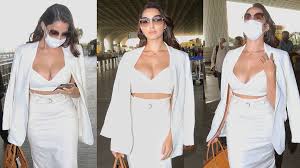 Actress nora fatehi is a diva and there's no doubt in it. Nora Fatehi Turns Heads At Mumbai Airport In A White Ensemble With A Plunging Neckline