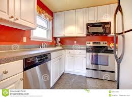 cozy kitchen room with red wall and