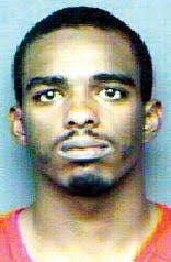 Convicted felon charged in shooting
