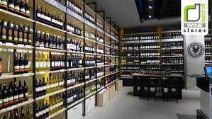 19 Stylish Retail Design Stores Interiors Around The World Retail Store Design Wine Store Supermarket Design