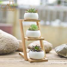 Here you will find, different size vary from 4cm to 120cm; China Modern Mini Ceramic Plant Pots With Three Layers Bamboo Stand China Plant Pot And Ceramic Plant Pot Price