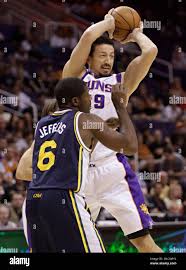 Phoenix Suns' Hedo Turkoglu, (19), of Turkey, pulls down a rebound over  Utah Jazz forward Othyus Jeffers during the first quarter of an NBA pre  season basketball game Tuesday, Oct. 12, 2010,