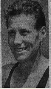 Peter McElroy, who passed away last Friday morning, is photographed in the  1976 or 1977 Manx Star passing the Highlander Inn in the Boundary Harriers  Half Marathon. Peter's obituary is here -