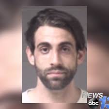 Asheville shoplifting suspects identified; One in custody, one still wanted