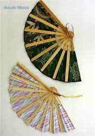 Fans can either be painted or decorated with appliques. How To Make A Folding Cloth Fan Fabric Hand Fan Hand Fans Diy Diy Fan