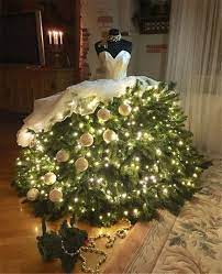 Have you seen those beautiful christmas trees converted from a mannequin and tree branches? People Are Upcycling Mannequins Into Gorgeous Christmas Tree Gowns Christmas Tree Dress Mannequin Christmas Tree Dress Form Christmas Tree