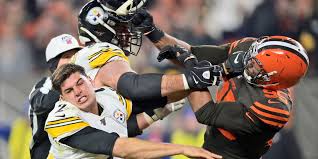 Baker mayfield and myles garrett of the cleveland browns celebrate a victory over the pittsburgh steelers in the afc wild card playoff game at heinz. Myles Garrett Ejected After Assaulting Qb Mason Rudolph With Helmet In The Final Seconds Of Browns Vs Steelers Game