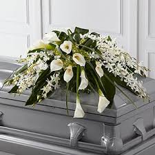 The best rated florist in brighton on google+. Angel Wings Casket Spray In Aitkin Mn Aitkin Flowers Gifts
