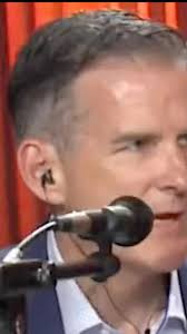 Rich Schulz with BASE Chicago, speaks with Fr. Greg Sakowicz