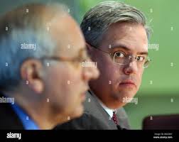 Robert DiClemente, of Citigroup Global Markets, speaks to reporters at a  news conference