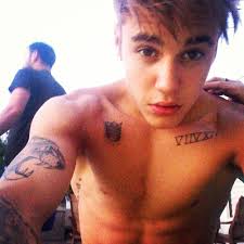 It seems like justin bieber has been on tattoo bender lately! Justin Bieber Tattoo Guide And Meanings From New Face Tattoo To That Selena Gomez Inking