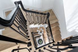 Victorian style staircase wood newel post haindrail brown. Project Gallery Bold Stair Balusters Blend Contemporary And Traditional Builder Magazine