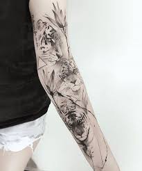 Tiger Tattoo Designs Combination Of Power Wisdom And Fear Of Death Tiger Tattoo Design Tattoos Tiger Tattoo