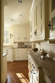 Nice Looking Hardware On Cream Cabinets Looks Like Laminate Countertops Also Nice Color Kitchen Cabinet Design Cream Kitchen Cabinets Kitchen Remodel