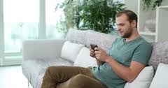 3 guys plays with the with blonde girl's anus. Cute Blonde Woman Watching A Movie On Mo Stock Video Pond5
