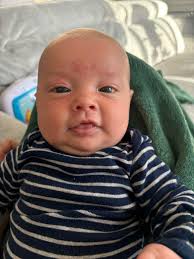 Lincoln sulking like a big baby, he wanted his bubbles out I tried telling  him its way to windy but he was having none of it so out the back we go