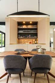 Two flat dining room pendant lights hover above the table like flying saucers. Best 60 Modern Dining Room Pendant Lighting Design Photos And Ideas Dwell
