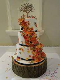 Autumn Wedding Cake With A Cascade Of Sugar Autumn Leaves Fall Wedding Cakes Amazing Cakes Cake