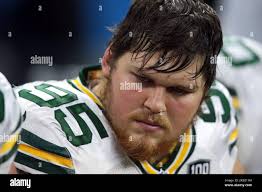 Green Bay Packers' Tyler Lancaster and Dean Lowry run a drill during NFL  football training camp Thursday, July 25, 2019, in Green Bay, Wis. (AP  Photo/Morry Gash Stock Photo