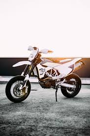 Dirt bike wallpapers, backgrounds, images 3840x2160— best dirt bike desktop wallpaper sort wallpapers by: Hd Wallpaper Dope White And Black Dirt Bike Parked On Gray Concrete Pavement Wallpaper Flare