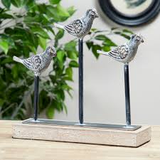 Bring your home environment to life with the iron bird figurine! Ophelia Co Ophelia Vintage Style Metallic Carved Metal Bird Figurine Wayfair
