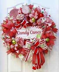 Find cool christmas decorations to make from candy canes, peppermint candy recipes, fun candy cane decorating ideas, cute · get in the holiday spirit by making homemade peppermint vodka. Home Living Wreaths Whimsical Deco Mesh Christmas Wreath Peppermint Candy Wreath Christmas Front Door Wreath Holiday Door Decor Front Door Wreath