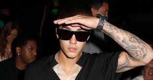 He got his first tattoos in inconspicuous places on his body, like his seagull tattoo and his jesus tattoo. Justin Bieber Selena Gomez Tattoo Cover Up